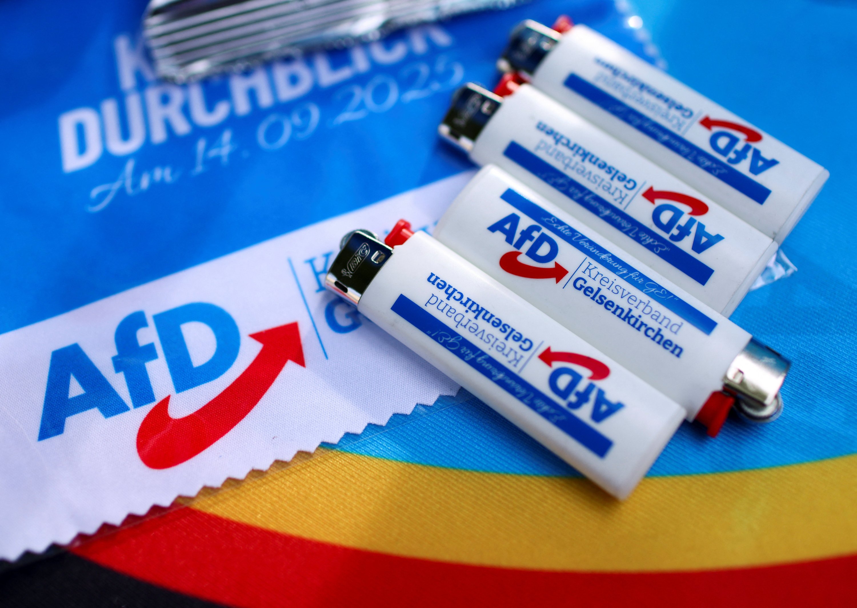Promotional items lie on a table in election campaign booths, Gelsenkirchen, Germany, Sept. 24, 2025. (Reuters Photo)