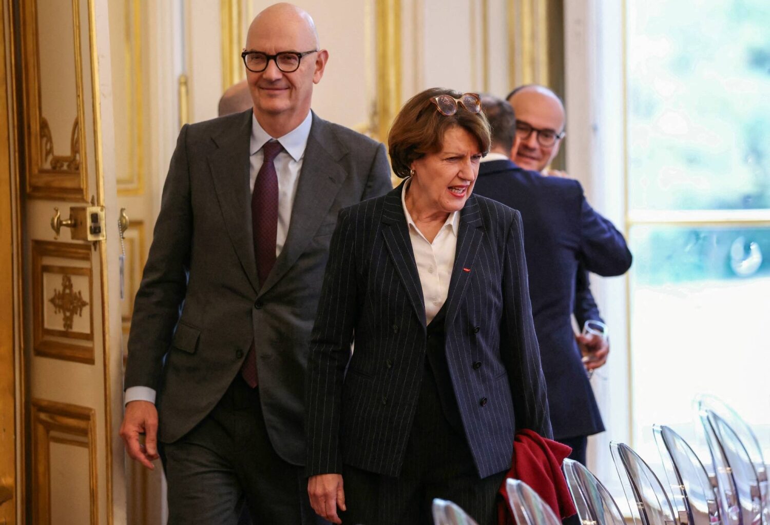 France's embattled prime minister faces clutch day in parliament