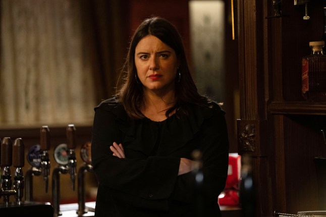 Zoe looks deep in thought while in the pub in EastEnders