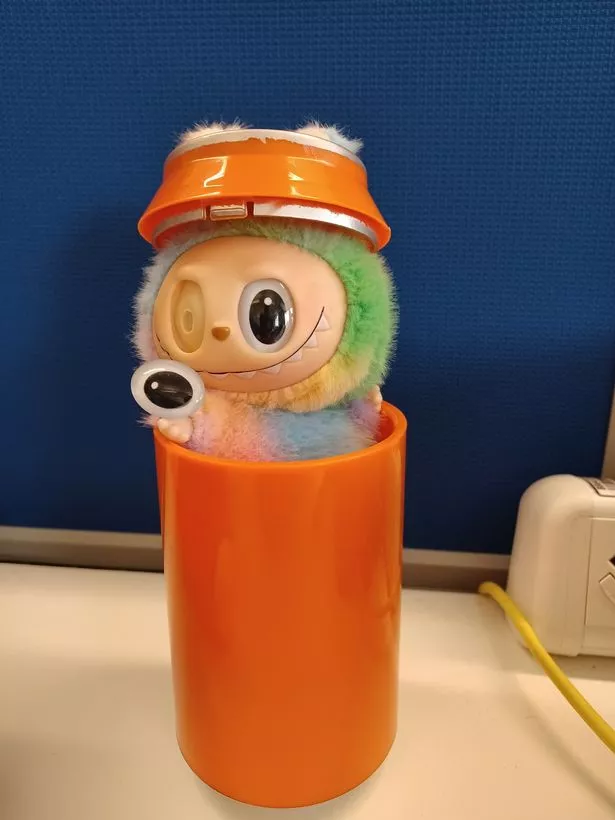 An eye falling off a fake Labubu in Wigan