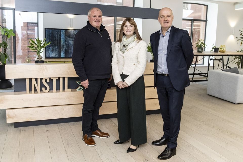Economy Minister Dr Caoimhe Archibald with Paddy O’Hagan, CEO of Instil (left), and Richard Christie, director of technology and services at Invest NI