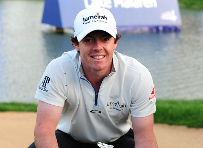 Rory McIlroy of Northern Ireland poses with the winners trophy after finishing at 18 under par on the final day of the Lake Malaren Shanghai Masters golf tournament in Shanghai on October 30, 2011. AFP PHOTO/Mark RALSTON (Photo credit should read MARK RALSTON/AFP/Getty Images)