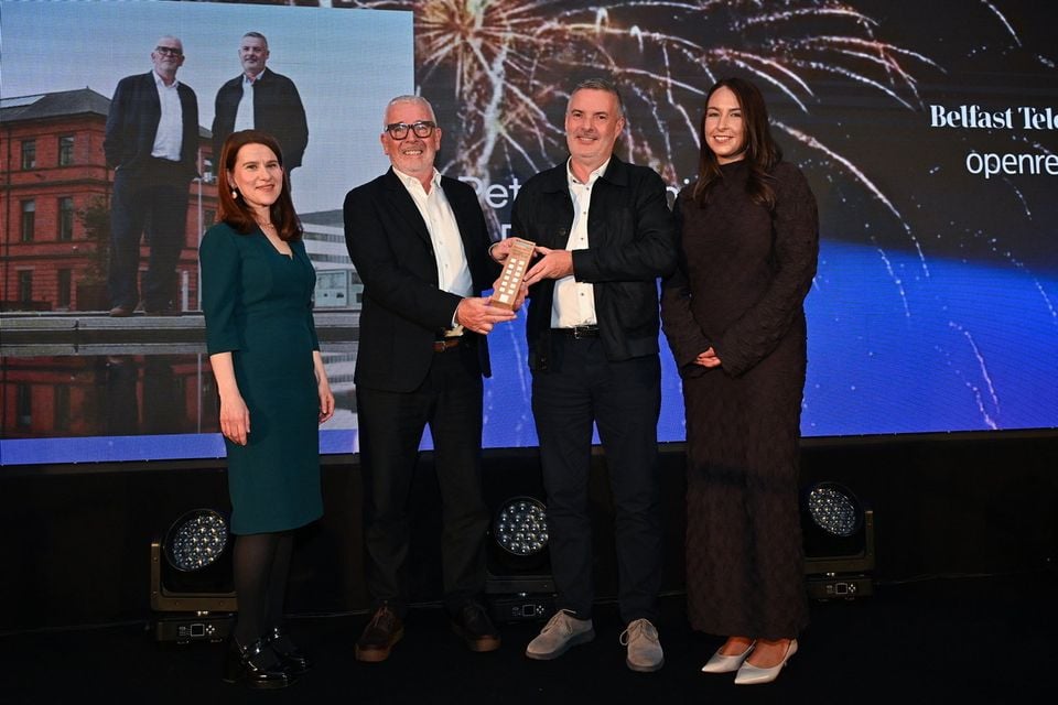 Peter Minnis (second from left) and Paul Crowe of TODD Architects receive the award for Property Personality of the Year at the 2025 Belfast Telegraph Property Awards from Lauren McGaughey, acting director of headline sponsor Openreach (right) and Margaret Canning, business editor of the Belfast Telegraph