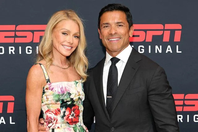 Dia Dipasupil/Getty Kelly Ripa and Mark Consuelos attend ESPN's 'Running With The Wolves' series premiere