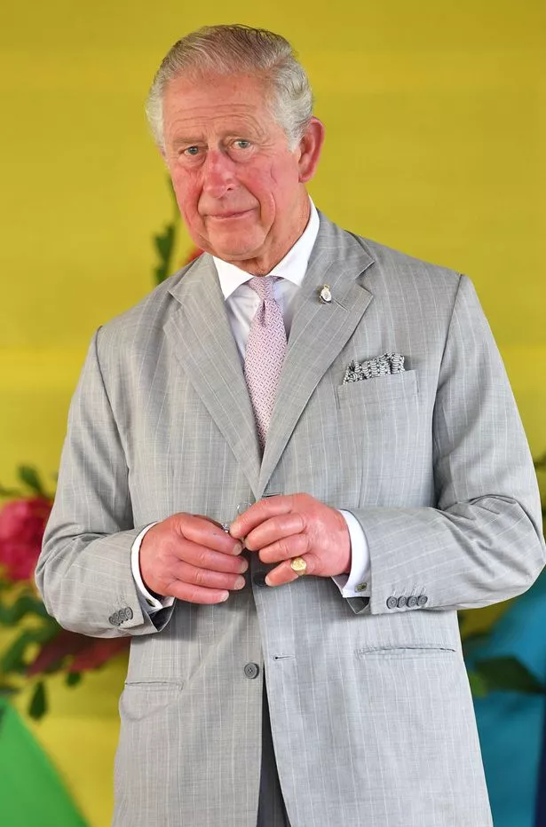 This picture of the King, often zoomed in on his hands, has been shared widely online 