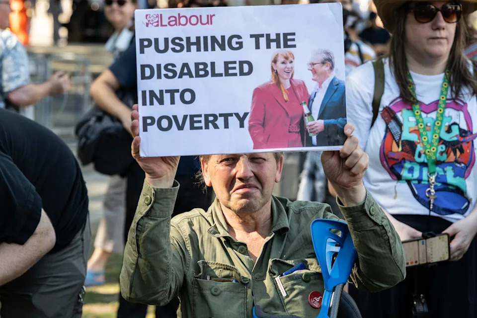 LONDON, ENGLAND - JUNE 30: Disabled people protest in Parliament square against welfare reforms on June 30, 2025 in London, England. Demonstrators are gathering under the slogan 