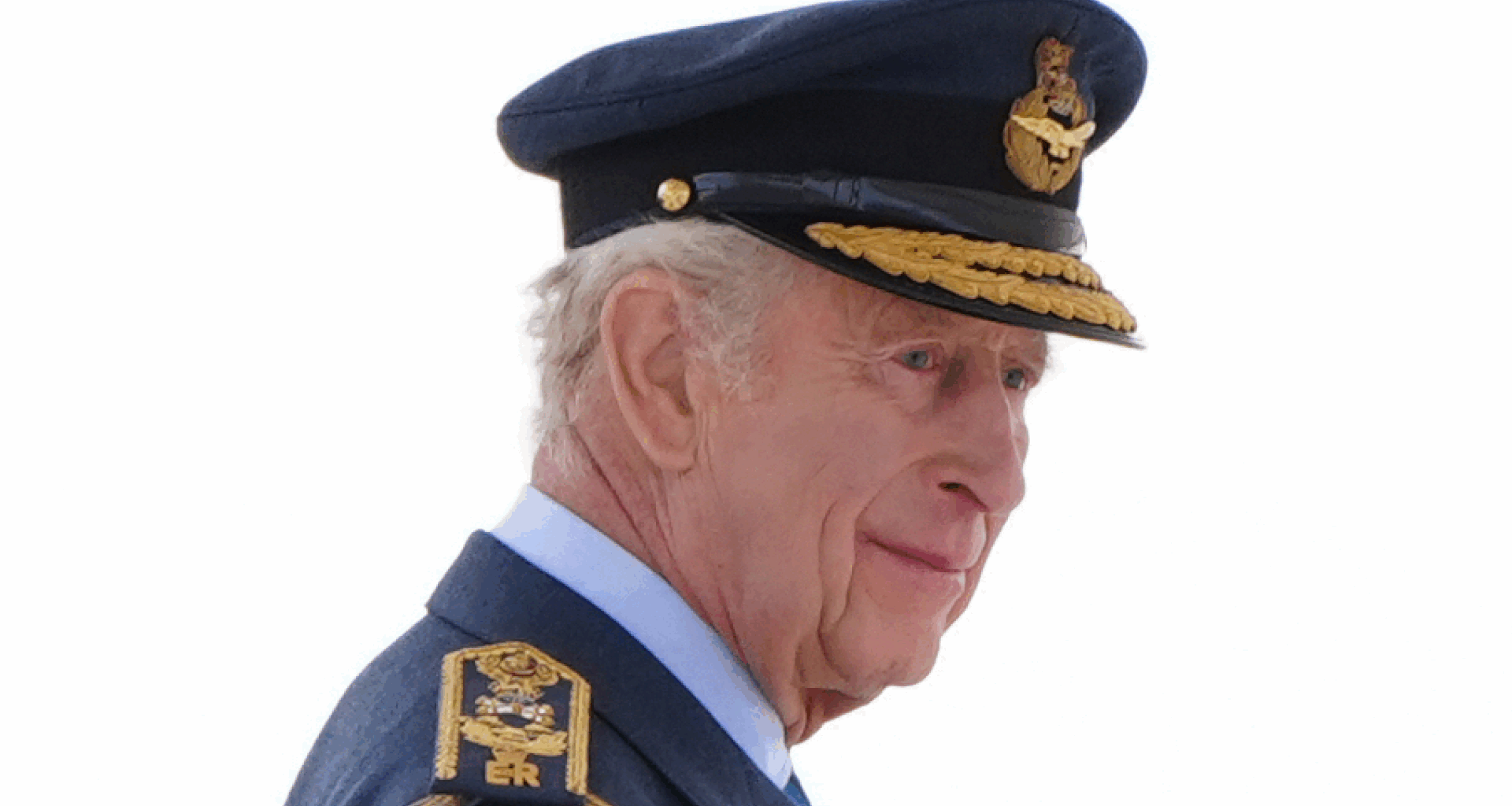 King Charles wearing a blue military uniform