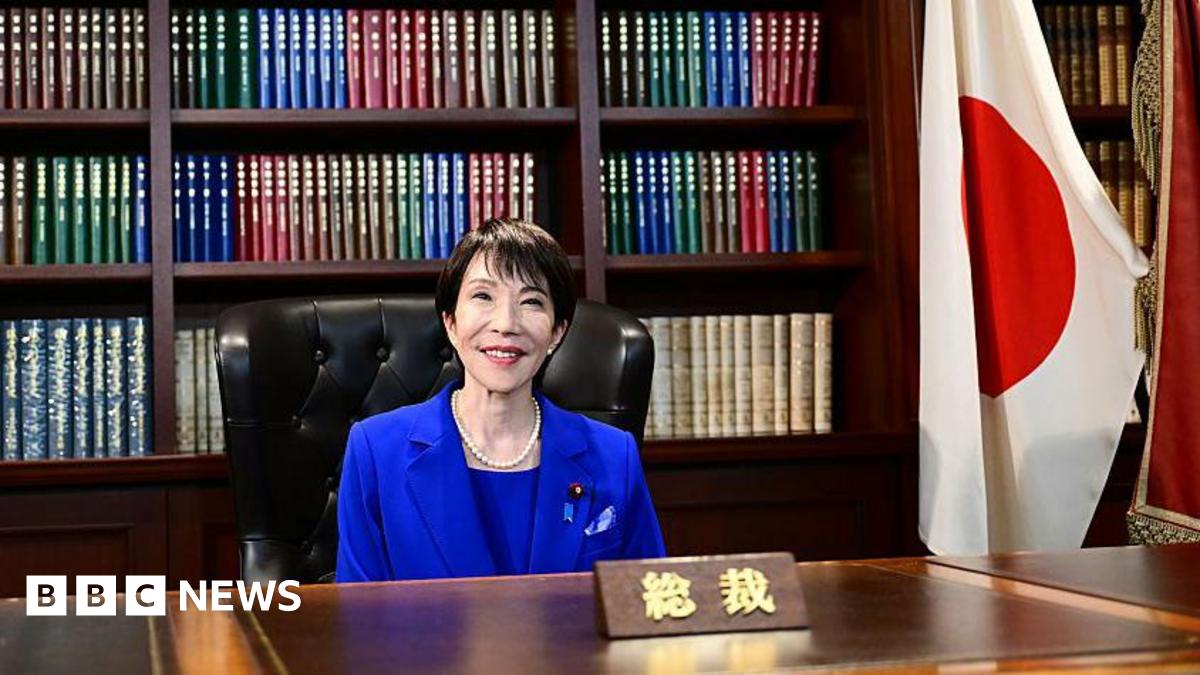Sanae Takaichi poses for a photo in the party leader's office after the LDP presidential election.