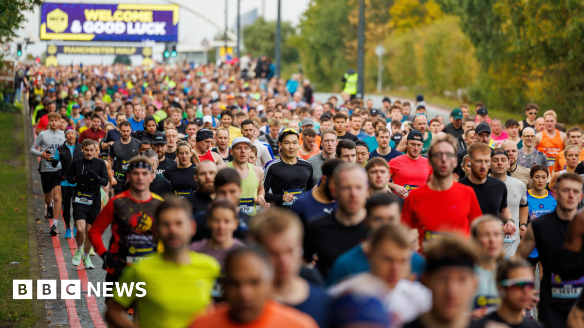 Runners run past the camera at last year's Manchester Half