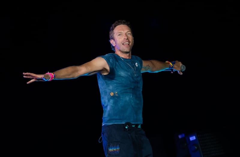 Chris Martin of Coldplay performs onstage during a concert at Wembley Stadium on August 22, 2025 in London, England.