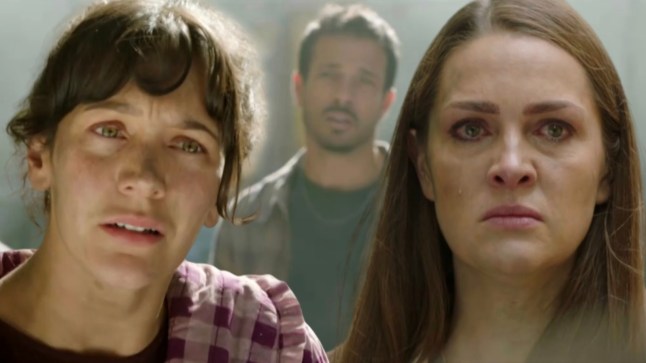 Cleo and Sienna as Dodger looms in the background in Hollyoaks