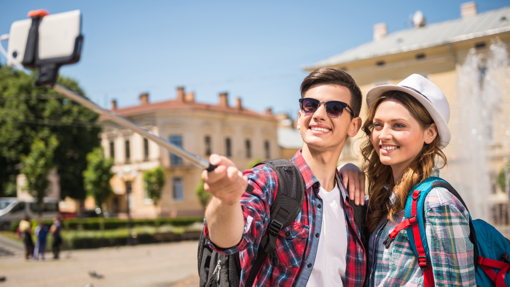 couple taking a picture with selfie stick