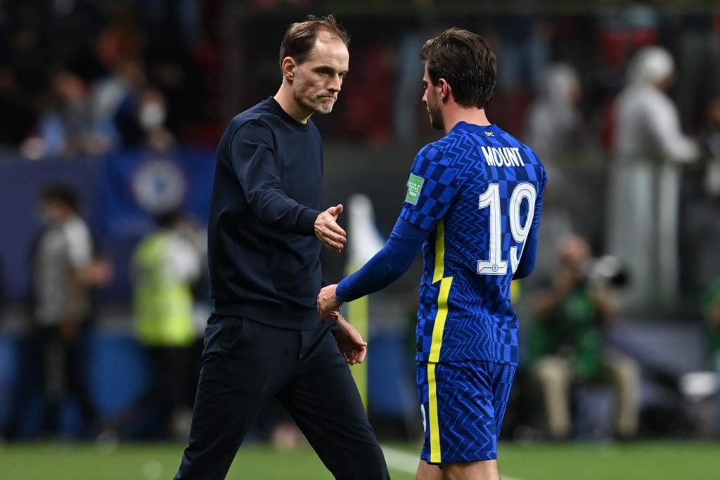 Mason Mount embraces Thomas Tuchel, Manager of Chelsea as he is substituted due to an injury during the FIFA Club World Cup UAE 2021 Final match between Chelsea and Palmeiras at Mohammed Bin Zayed Stadium on February 12, 2022