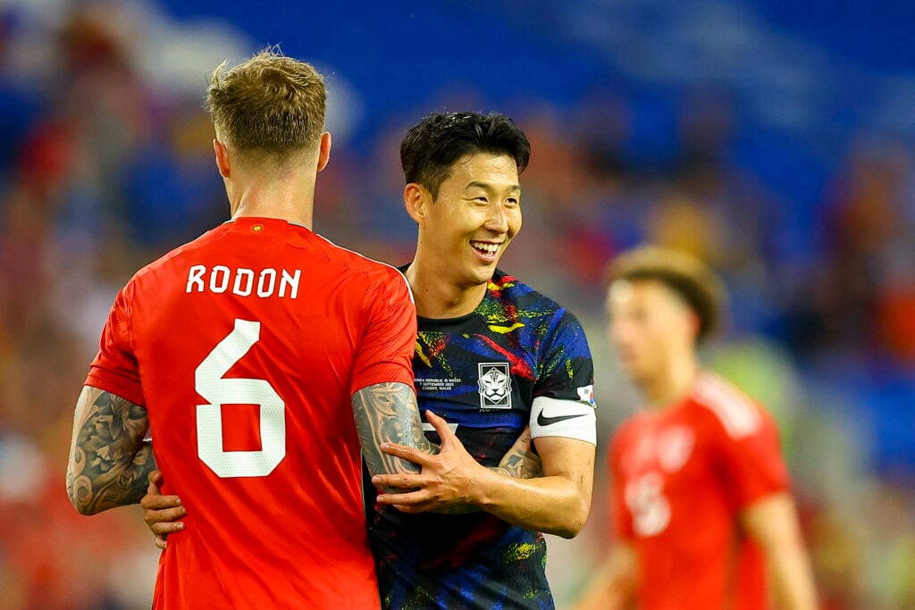 Joe Rodon and Heung-min Son meet during a clash between Wales and South Korea
