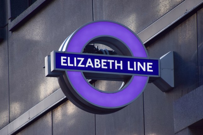 General view of an Elizabeth Line sign at a station as