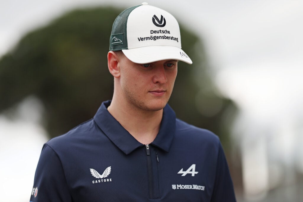 Mick Schumacher arrives at a WEC event for Alpine