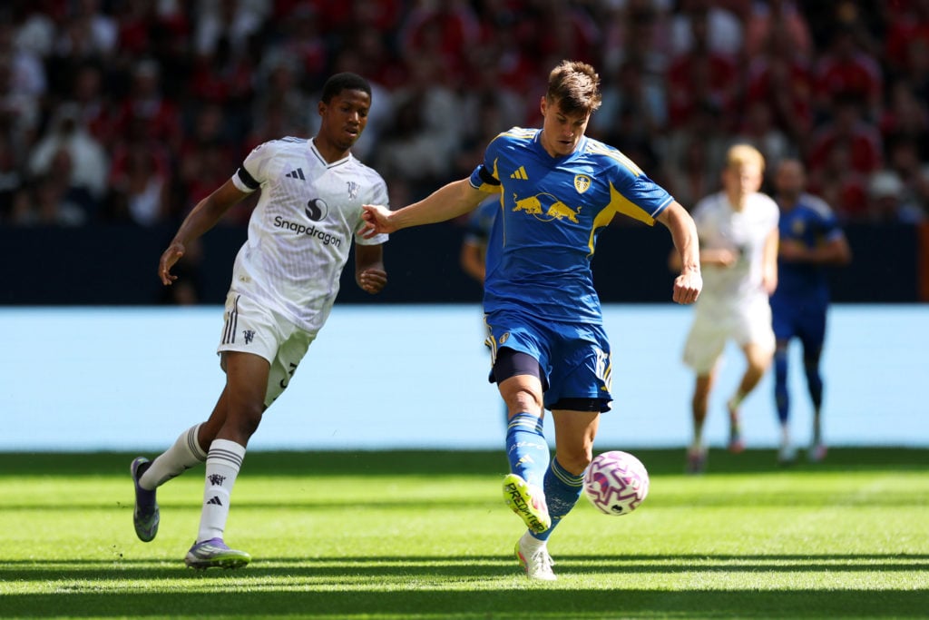 Jaka Bijol of Leeds United passes the ball whilst under pressure from Chido Obi of Manchester United during the pre-season friendly match between Manchester United and Leeds United at Strawberry Arena on July 19, 2025