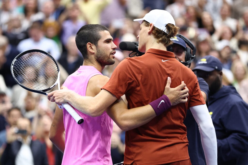 Carlos Alcaraz and Jannik Sinner embrace after the 2025 US Open final
