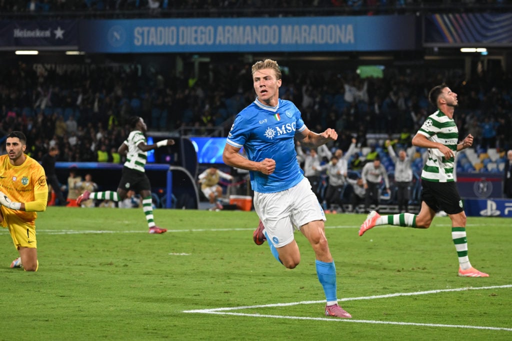 Rasmus Hojlund runs in celebration after scoring for Napoli vs Sporting CP.