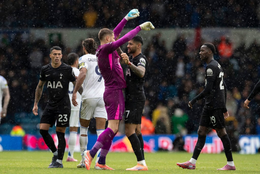 Guglielmo Vicario celebrates with Cristian Romero as Tottenham beat Leeds.