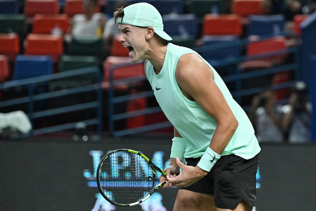 Holger Rune celebrates beating Giovanni Mpetshi Perricard at the Shanghai Masters.