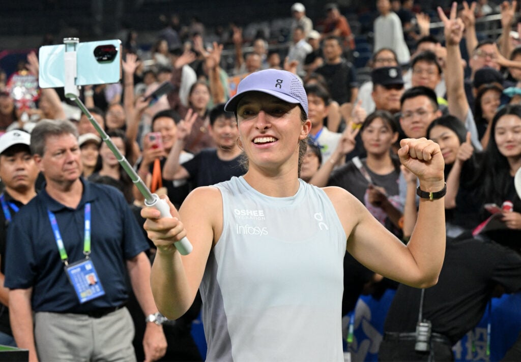 Iga Swiatek reacts at the 2025 Wuhan Open.