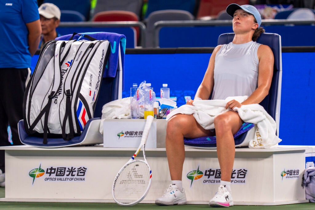 Iga Swiatek reacts in Wuhan.
