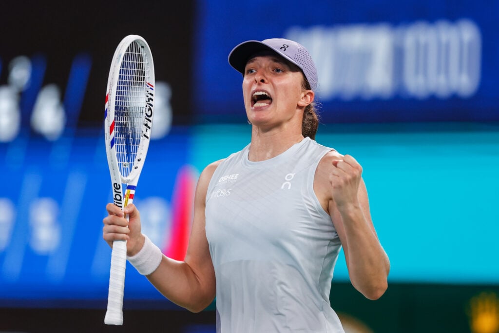 Iga Swiatek celebrates at the Wuhan Open.