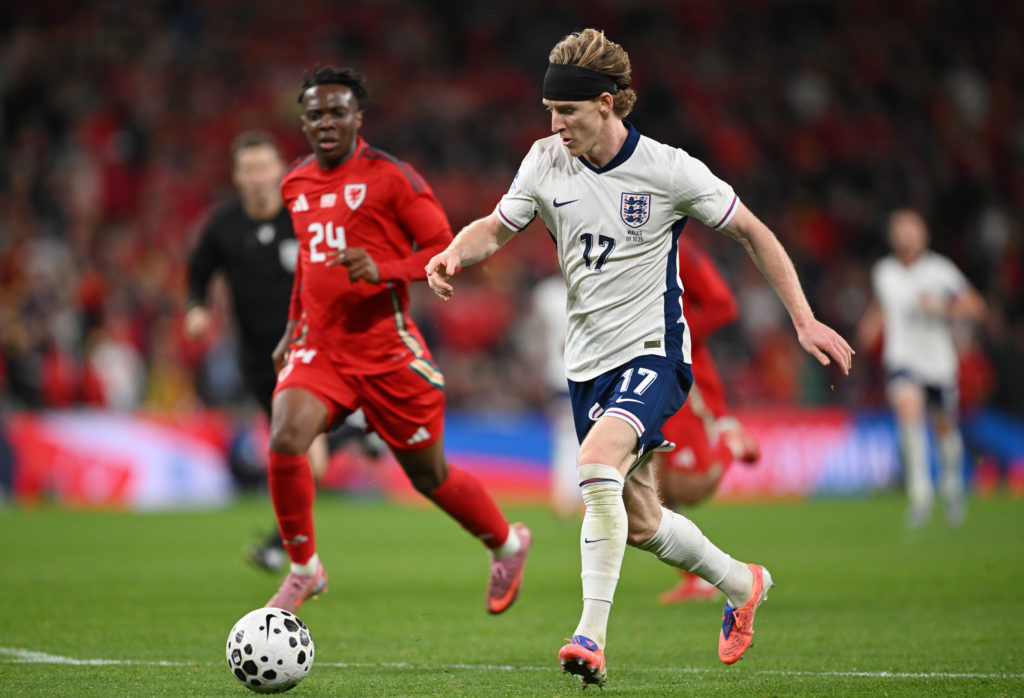 Anthony Gordon runs with the ball during a friendly between England and Wales at Wembley.