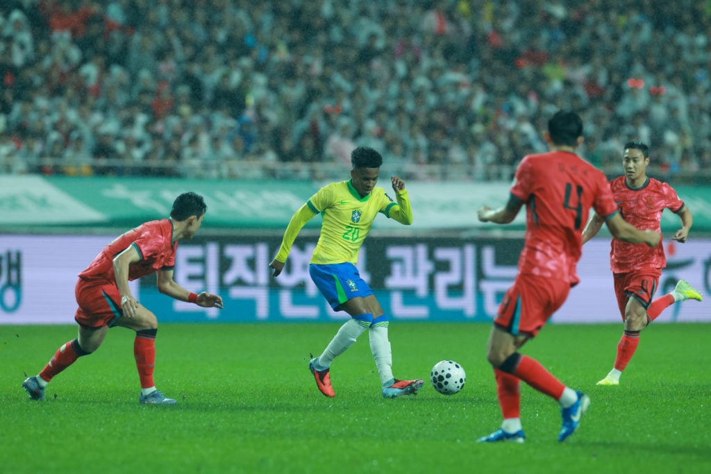 Brazil winger Estevao Willian surrounded by three South Korea players in an international friendly.