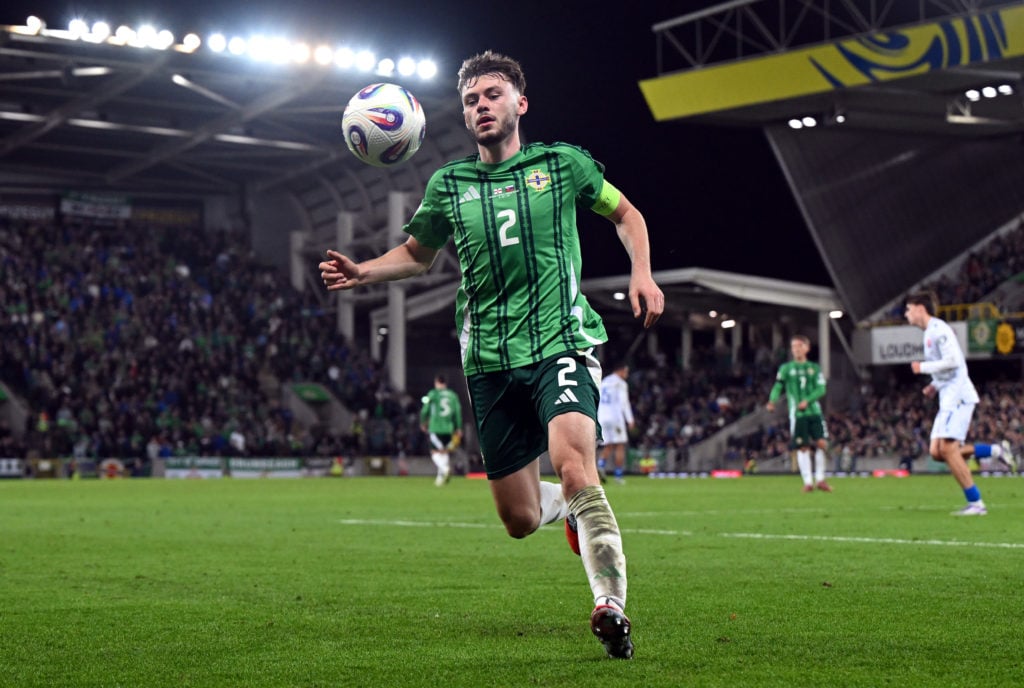 Conor Bradley attempts to take control of the ball during Northern Ireland's FIFA World Cup qualifier against Slovakia at Windsor Park.