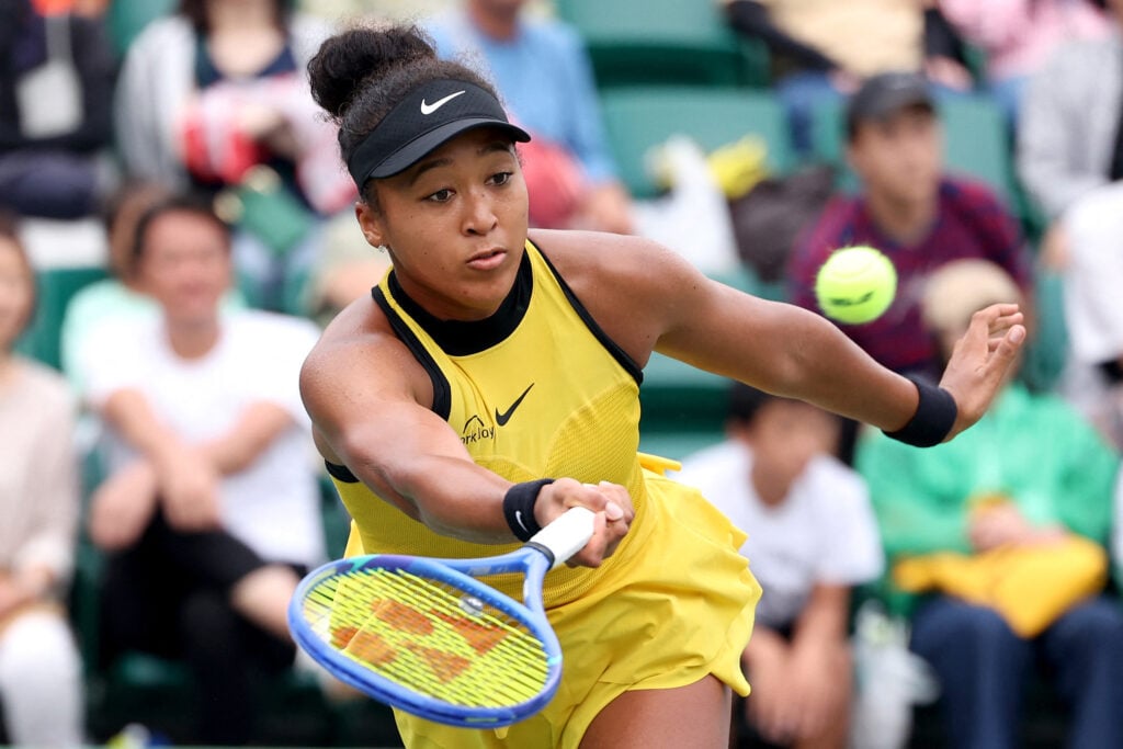 Naomi Osaka hits a return to Japan's Wakana Sonobe during their women's singles match at the Japan Open tennis tournament in Osaka.