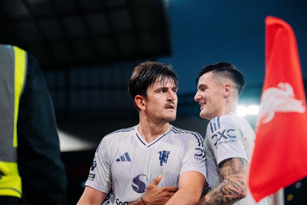 Harry Maguire scores during Liverpool v Manchester United in the Premier League