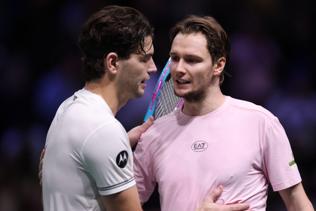 Alexander Bublik and Taylor Fritz embrace after their match at the 2025 Paris Masters