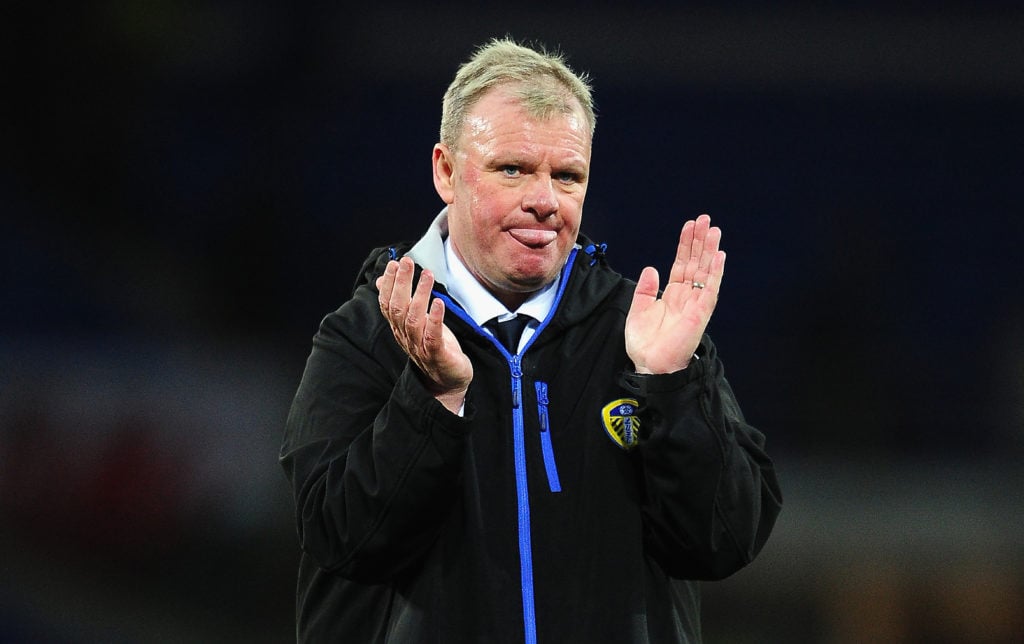 Steve Evans applauds fans during Cardiff City v Leeds United - Sky Bet Championship