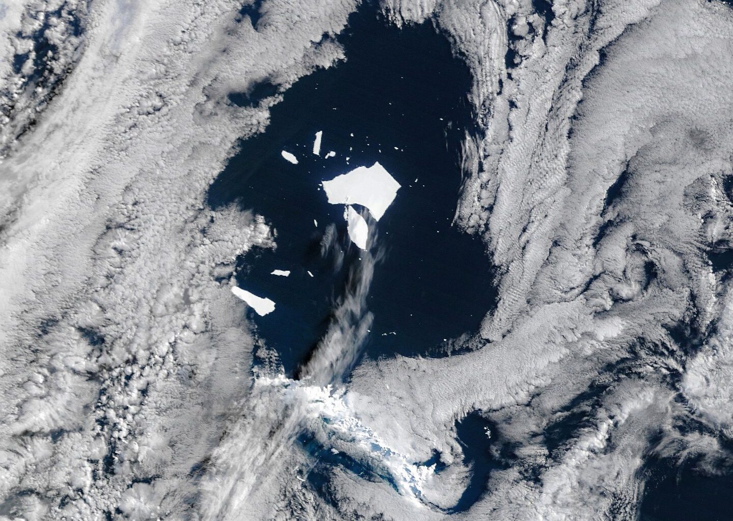 NASA Captures Stunning Images of a Titanic Iceberg’s Collapse