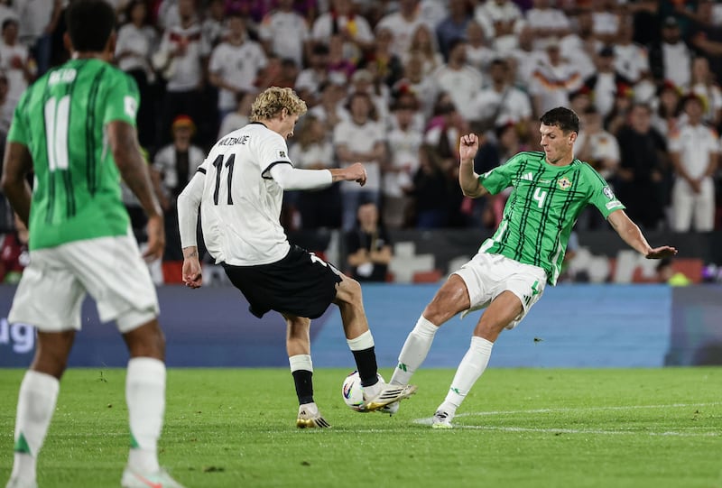 Northern Ireland's Eoin Toal with Germany's Nick Woltemade during Sunday's World Cup Qualifier at the RheinEnergie Stadium, Cologne