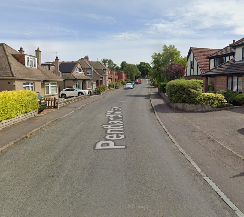 A street view of Pentland View with houses and parked cars on both sides.