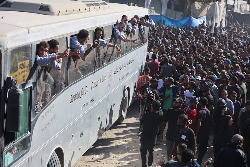 People gather to welcome Palestinians released from Israeli prisons, under a Gaza ceasefire and hostage exchange deal, outside the Nasser hospital in Khan Younis in Gaza. Photograph: Omar Al-Qattaa/ AFP via Getty Images