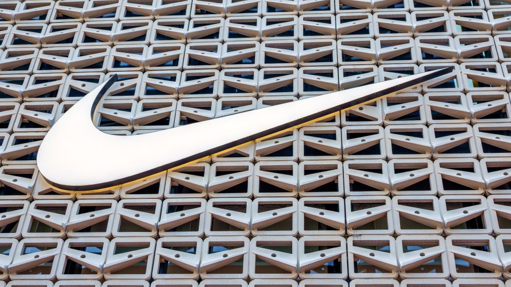 nike swoosh logo, miami beach store facade. swoosh, nike logo