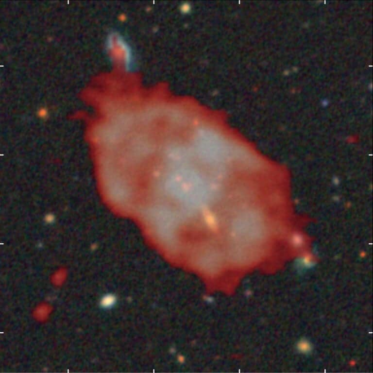 Optical RGB image from the Legacy Surveys, overlaid with radio emission in red from the LOFAR Two-Metre Sky Survey.
