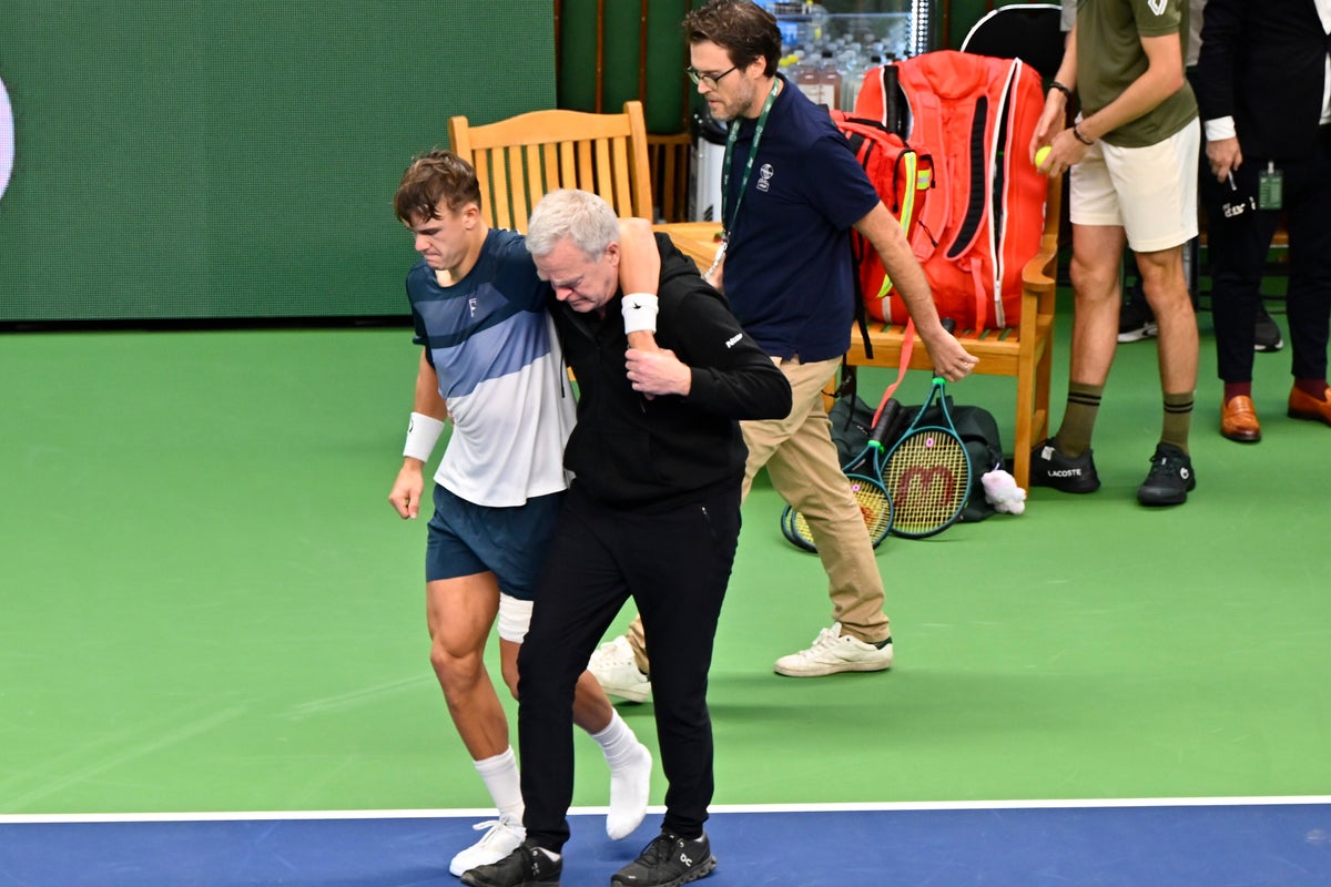 Holger Rune limps off court in tears after devastating injury blow