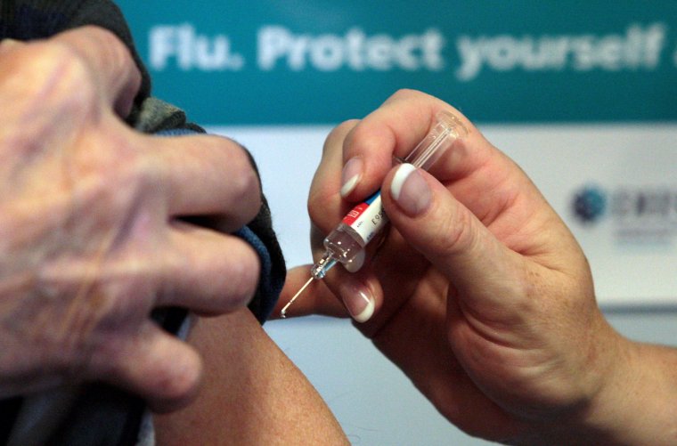 File photo dated 05/10/09 of a patient receiving the seasonal flu vaccine, as the NHS in England is testing whether people can book their flu jabs online. PA Photo. Issue date: Thursday October 13, 2022. People successfully used the National Booking Service during the Covid-19 vaccination programme with those unable to get online given alternative ways to book. See PA story HEALTH Jab. Photo credit should read: David Cheskin/PA Wire
