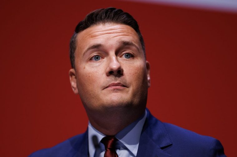 LIVERPOOL, ENGLAND - SEPTEMBER 30: Health Secretary Wes Streeting holds a speech during the Labour Conference at ACC Liverpool on September 30, 2025 in Liverpool, England. Keir Starmer addresses Labour Conference for the second time since the party came to power, announcing the launch of NHS Online in 2027 to modernise the health service. (Photo by Dan Kitwood/Getty Images)