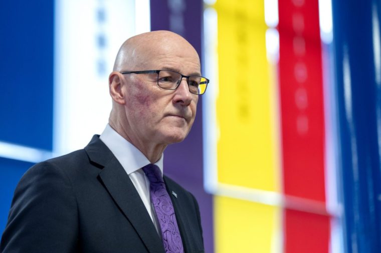 File photo dated 23/6/2025 of First Minister John Swinney who has said the Scottish Government is committed to putting "more money in people's pockets" and has called on the UK Government to scrap the two-child limit benefit cap. As Challenge Poverty Week begins, Mr Swinney said the Scottish Government's cost-of-living guarantee is delivering real savings for families across the country. Issue date: Monday October 6, 2025. PA Photo. Photo credit should read: Jane Barlow/PA Wire
