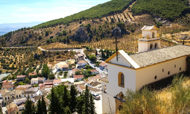 An aerial view of a church and the main village of Moclin, Granada, Andalusia, Spain