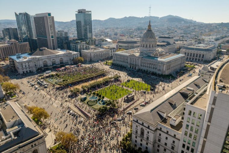 Protesters gather at the Civic Center in San Francisco, on Saturday, Oct. 18, 2025, during the second nationwide