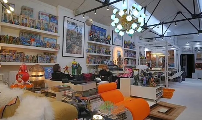 Fiona Bruce talks to Jonathan Ross inside his toy room during an episode of Antiques Roadshow (Picture: BBC)