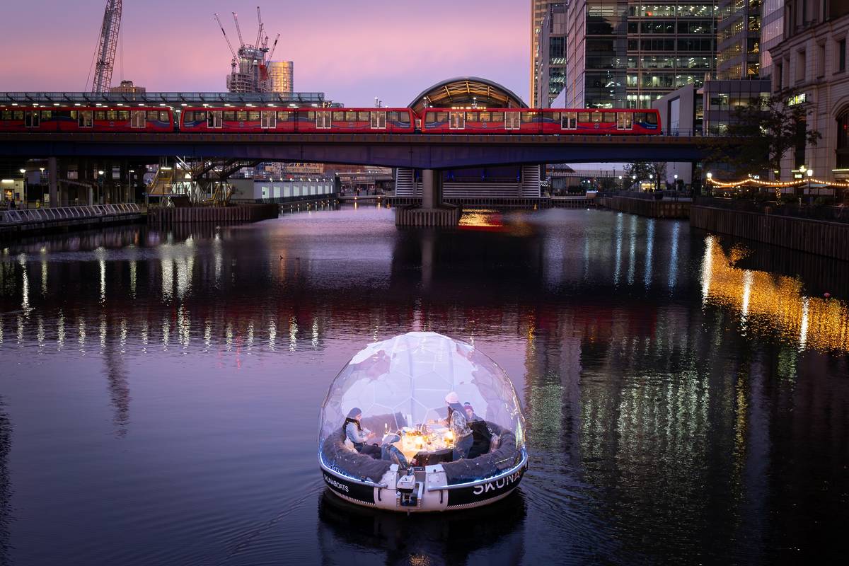 Skuna igloo boat setting out across the river