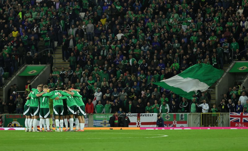 Pacemaker Belfast 13-10-25
Northern Ireland v Germany - World Cup Qualifier
Northern Ireland's players form a huddle  during this evening's game at the National Stadium, Belfast.  Photo by David Maginnis/Pacemaker Press